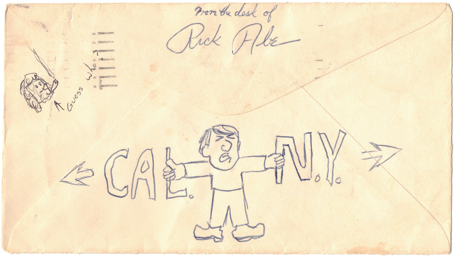 The back of an old envelope with a 'from the desk of Rick Abe' handwritten script at the top. There is an illustration just below the flap of a cartoon man, teeth gritted and eyes closed. His arms are stretched out and holding on tightly to sets of block letters that say CAL. on the left and N.Y. on the right.